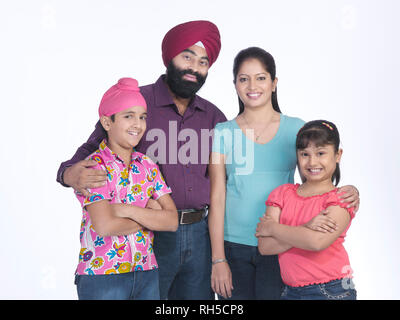 PORTRAIT D'UNE FAMILLE DE QUATRE SARDAR SIKH Banque D'Images