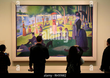 Les visiteurs avec Georges Seurat, un dimanche après-midi sur l'île de La Grande Jatte (1884) dans l'Art Institute of Chicago.chicago.IL.USA Banque D'Images