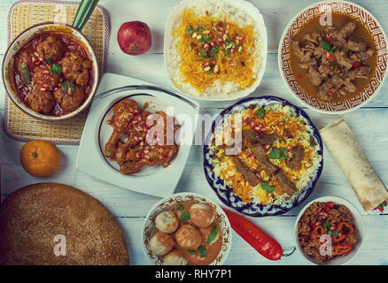 Uisine Afghani, l'Asie centrale, des plats traditionnels assortiment vue d'en haut. Banque D'Images