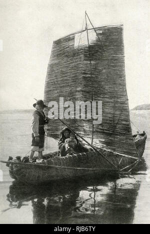 Famille autochtone en bateau, Bolivie, Amérique du Sud Banque D'Images