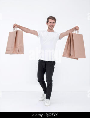 Jeune homme Enjoying Shopping Trip Banque D'Images