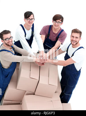 Hommes portant livraison pile de boîtes. Isolated on white Banque D'Images