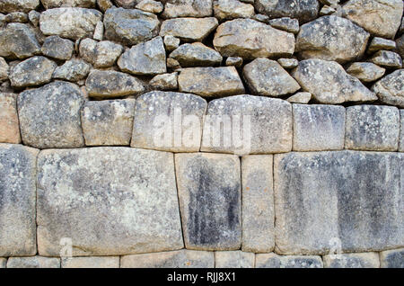 Détail de murs en pierre sculptée de l'Inca à Machu Picchu Banque D'Images