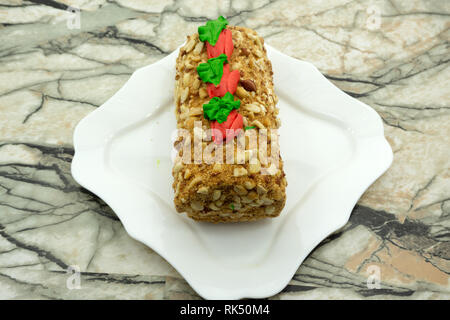 Rouleau de chocolat un merveilleux dessert riche . Banque D'Images