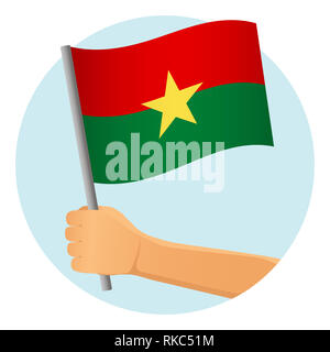 Burkina Faso drapeau dans la main. Contexte patriotique. Drapeau national du Burkina Faso illustration Banque D'Images