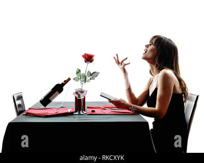 Une femme dans la salle à manger d'attente silhouettes sur fond blanc Banque D'Images