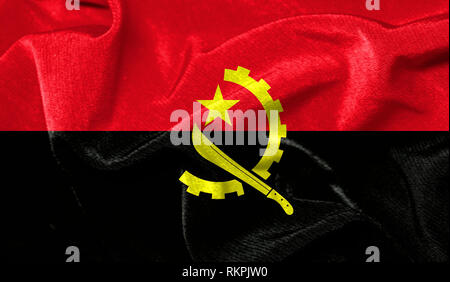 Drapeau réaliste d'Angola sur la surface d'un tissu Banque D'Images