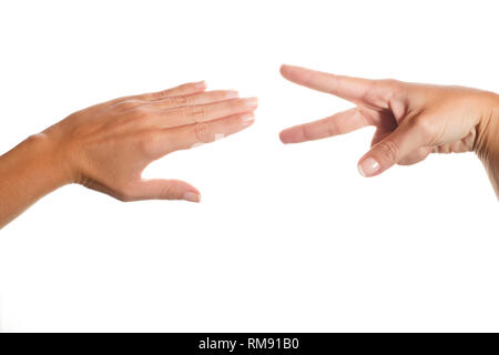 Closeup of hands making : Roche, papier, ciseaux isolated on white Banque D'Images