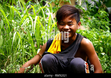 ANTIPOLO CITY, PHILIPPINES - le 25 janvier 2019 : Young Asian boy poser et montrer différentes expressions du visage. Banque D'Images