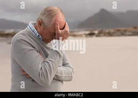 Man à la plage Banque D'Images