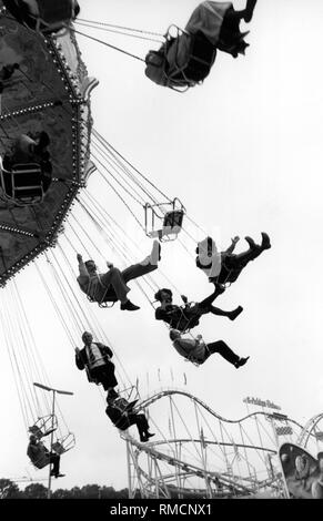 Carrousel de rotation à l'Oktoberfest de Munich (sans date). Banque D'Images