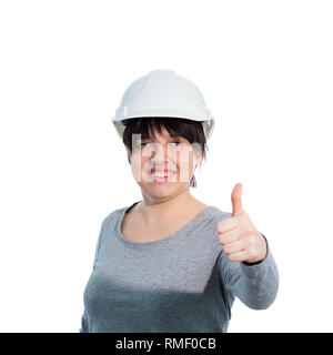 Happy young woman wearing ingénieur casque de protection smiling showing thumb up geste positif à la caméra d'isolated over white backgrou Banque D'Images