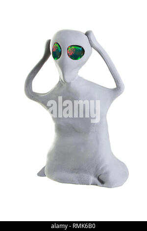 Alien gris fait d'argile sur un fond blanc Banque D'Images