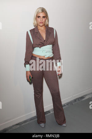 Tiger Lilly Taylor sur le banc avant pendant la Marta Jakubowski Automne/Hiver 2019 London Fashion Week show à BFC, dossiers de Londres. Banque D'Images