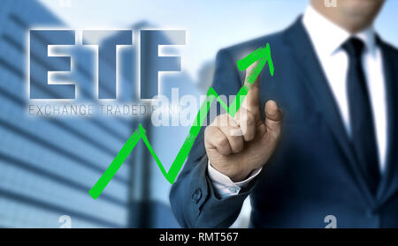 Concept de l'ETF est illustré par l'homme d'affaires. Banque D'Images