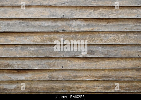 Vieux bois horizontal stacked wall background. Banque D'Images