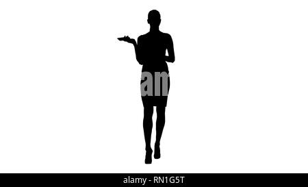 Silhouette femme crier et dire au téléphone. Banque D'Images