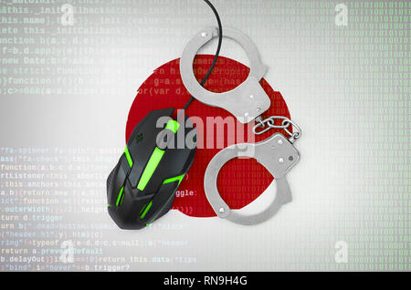 Drapeau du Japon moderne et menottés. souris d'ordinateur rétroéclairé Concept créatif de lutte contre la criminalité informatique, les pirates et la piraterie Banque D'Images