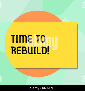 Main conceptuel écrit, indiquant le temps de reconstruire. Photo d'affaires mettant en vedette bon moment pour rénover les espaces ou des stratégies visant à innover couleur rectangulaire Banque D'Images
