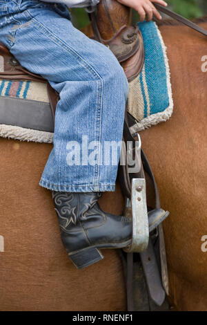 Close-up of cowboy boot en étrier à cheval Banque D'Images