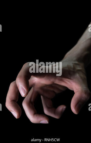 L'envers de la main humaine La violence du crime Devil Concept dans le style de couverture de livre. À l'envers main humaine vue Portrait pour crime Devil Concept Violence Banque D'Images