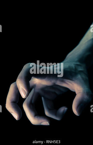 Vintage à l'Envers main humaine pour la violence du crime Devil Concept dans le style de couverture de livre. À l'envers main humaine vue Portrait de la violence du crime diable Con Banque D'Images