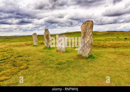 La Formation de Pierre mégalithe Callanish Standing Stones, Stone Circle sous un ciel nuageux, l'île de Lewis et Harris, Outer Hebrides Banque D'Images