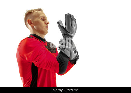 Un joueur de foot gardien debout à studio. Silhouette isolated on white background studio Banque D'Images