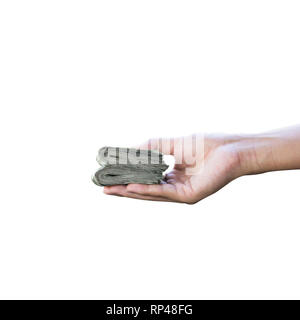 Portrait d'un homme part de la détention de monnaie ou un billet isolé sur fond blanc. Vue de côté. Banque D'Images