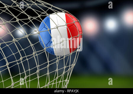 Soccerball avec drapeau dans net Banque D'Images