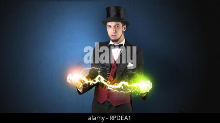 Mousseux magicien super power entre ses deux mains Banque D'Images