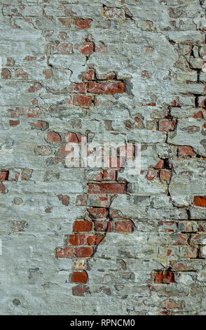 Fond texture mur de briques cassées en difficulté Banque D'Images