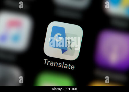 Un gros plan de l'icône de l'application Google Translate, comme on le voit sur l'écran d'un téléphone intelligent (usage éditorial uniquement) Banque D'Images