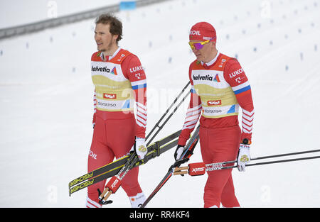 Seefeld, Autriche. Feb 24, 2019. Cross Country, Championnat du monde, Sprint par équipe Hommes, classique, Final. Alexander Bolshunov (r) et Gleb Retivykh à partir de la Russie réagir dans la cible. Credit : Hendrik Schmidt/dpa-Zentralbild/dpa/Alamy Live News Banque D'Images