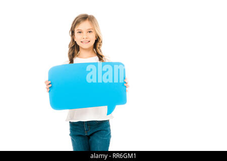 Cute smiling child holding blue speech bubble isolated on white Banque D'Images