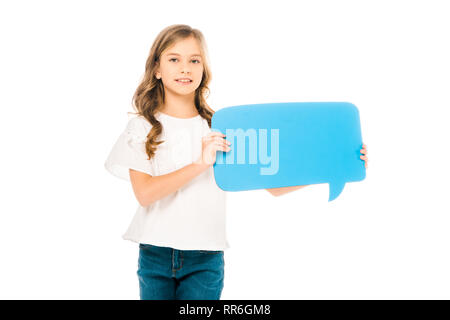 Adorable enfant smiling holding blue speech bubble isolated on white Banque D'Images