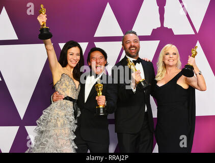 Los Angeles, USA. Feb 24, 2019. Les producteurs de 'gratuitement', Elizabeth Chai Vasarhelyi, Jimmy Chin, Evan Hayes et Shannon Dill posent à la 91 Awards dans la salle de presse pendant au Hollywood and Highland le 24 février 2019 à Hollywood, Californie Crédit : Tsuni/USA/Alamy Live News Banque D'Images