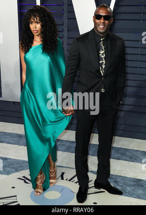 BEVERLY HILLS, LOS ANGELES, CA, USA - 24 février : Sabrina Dhowre et Idris Elba arriver au 2019 Vanity Fair Oscar Party organisée à l'Annenberg Center for the Performing Arts le 24 février 2019 à Beverly Hills, Los Angeles, Californie, États-Unis. (Photo par Xavier Collin/Image Press Office) Banque D'Images