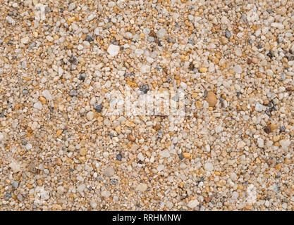 La texture du sable gravier jaune Arrière-plan de conception. Petit gravier sable texture background Banque D'Images