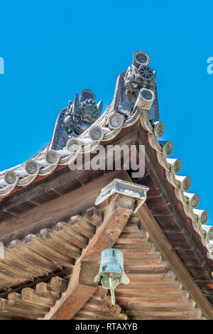 Onigawara Ogre gobelin (tile) détail à toit pagode à cinq étages (Rendez-Ju-No à) au Temple Kofuku-ji. Trésor National du Japon. Situé à Noborioji Distri Banque D'Images