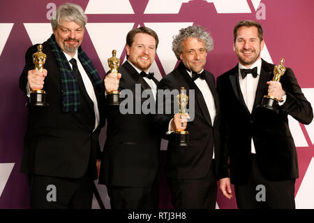 Ian Hunter, Tristan Myles, Paul Lambert et J. D. Schwalm, gagnants de meilleurs effets visuels pour 'Premier homme', poser dans la salle de presse lors de la 91e assemblée annuelle de remise des oscars à Hollywood et Highland Center le 24 février 2019 à Hollywood, Californie. Banque D'Images