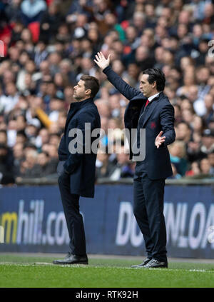 Londres, Royaume-Uni. 2e Mar, 2019. L'entraîneur-chef de l'arsenal Unai Emery (R) et Tottenham Hotspur entraîneur en chef Mauricio Pochettino sont vus au cours de la Premier League match entre Arsenal et Tottenham Hotspur à Londres, Angleterre le 2 mars 2019. Pour un usage éditorial uniquement. Pas À VENDRE À DES FINS DE MARKETING OU DE CAMPAGNES PUBLICITAIRES. Pas d'utilisation non autorisée avec l'AUDIO, VIDÉO, données, listes de luminaire, club ou la Ligue de logos ou services 'LIVE'. En ligne De-MATCH UTILISATION LIMITÉE À 45 IMAGES, aucune émulation. Aucune UTILISATION DE PARI, DE JEUX OU D'UN CLUB OU LA LIGUE/DVD PUBLICATIONS. Credit : Han Yan/Xinhua/Alamy Live News Banque D'Images