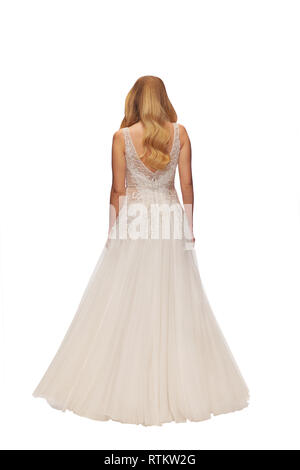 Femme blonde dans une robe de mariage, isolée, vue arrière