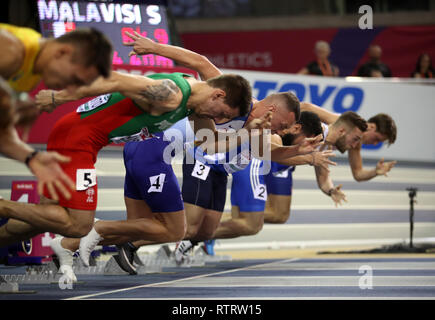 La société britannique Richard Kilty (centre) en action au cours de la chaleur de 60 millions d'hommes pendant cinq jours deux de l'Indoor d'athlétisme à l'Emirates Arena, Glasgow. Banque D'Images