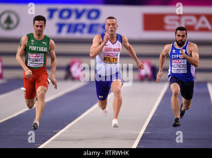 La société britannique Richard Kilty concurrentes dans sa chaleur dans la Men's 60m au cours de la deuxième journée de l'Indoor d'athlétisme à l'Emirates Arena, Glasgow. Banque D'Images