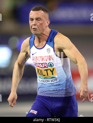 La société britannique Richard Kilty au cours de la Men's 60m demi-finale lors de la deuxième journée de l'Indoor d'athlétisme à l'Emirates Arena, Glasgow. Banque D'Images