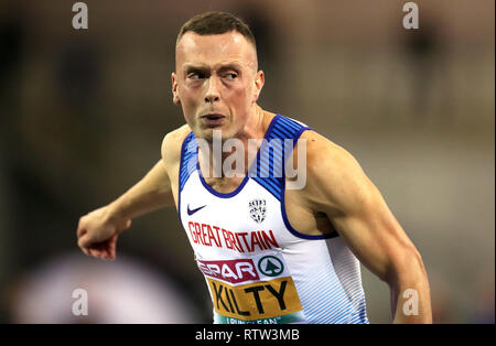 La société britannique Richard Kilty au cours de la Men's 60m demi-finale lors de la deuxième journée de l'Indoor d'athlétisme à l'Emirates Arena, Glasgow. Banque D'Images