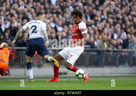 Le stade de Wembley, Londres, Royaume-Uni. 2 mars 2019. Alex Iwobi d'Arsenal prend sur Kieran Trippier de Tottenham Hotspur pendant le premier match de championnat entre Arsenal et Tottenham Hotspur au stade de Wembley le 2 mars 2019 à Londres, en Angleterre. Credit : PHC Images/Alamy Live News Credit : PHC Images/Alamy Live News Credit : PHC Images/Alamy Live News Credit : PHC Images/Alamy Live News Banque D'Images