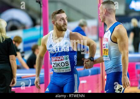 Glasgow, Ecosse, Royaume-Uni. 2 mars, 2019. Richard KILTY GBR, ZÍKOS Konstadínos GRE concurrentes dans les 60m Hommes événement secion durant la deuxième journée de l'Europe d'athlétisme en salle 2019 à Emirates Arena de Glasgow, Ecosse, Royaume-Uni. Crédit : 2.03.2019 Cronos/Alamy Live News Banque D'Images