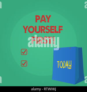 Signe texte montrant vous payer en premier. Finances personnelles photo conceptuelle d'économiser de l'argent pour l'avenir Banque D'Images